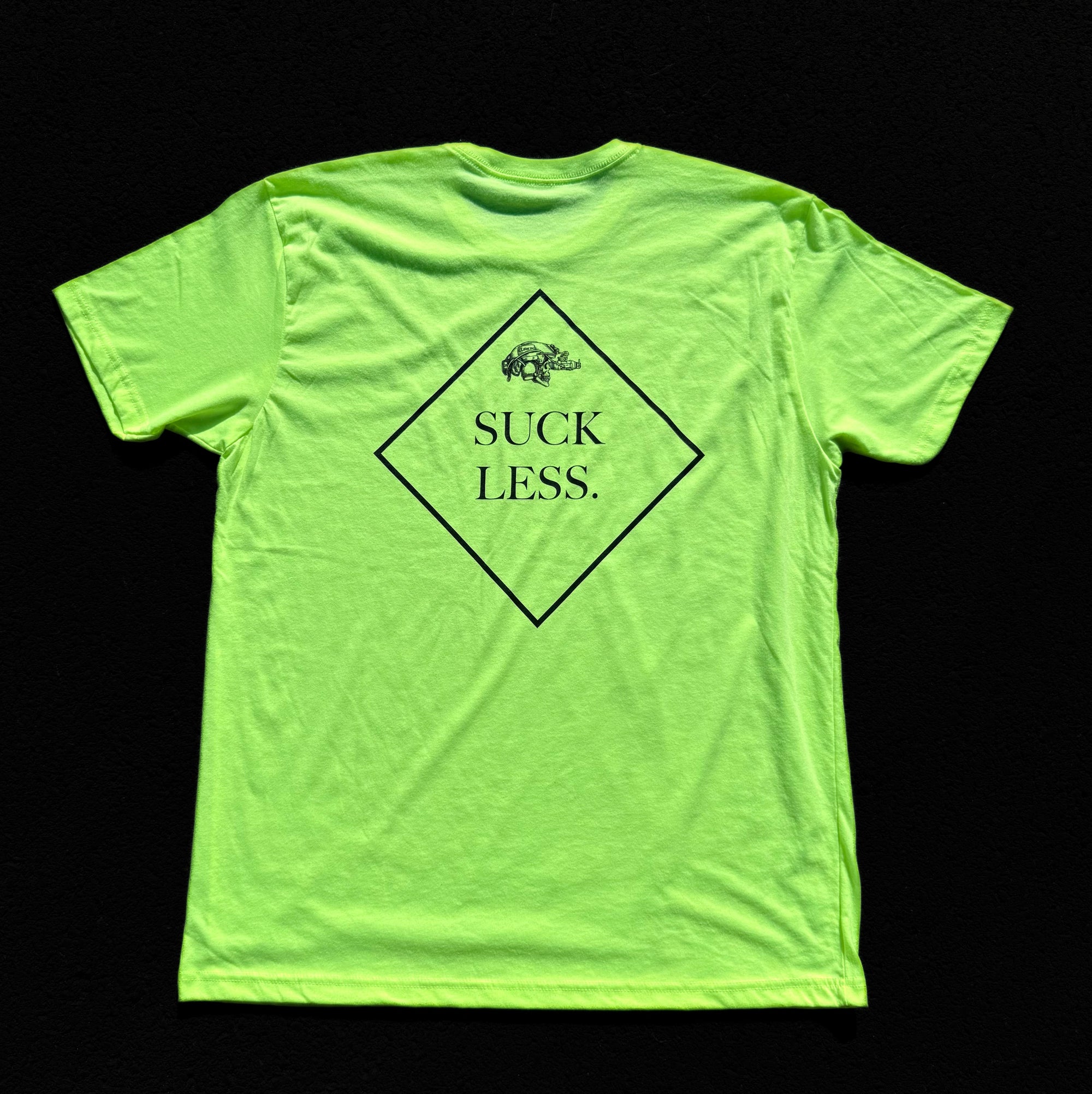Neon yellow t-shirt with 'Suck Less' text on a black background