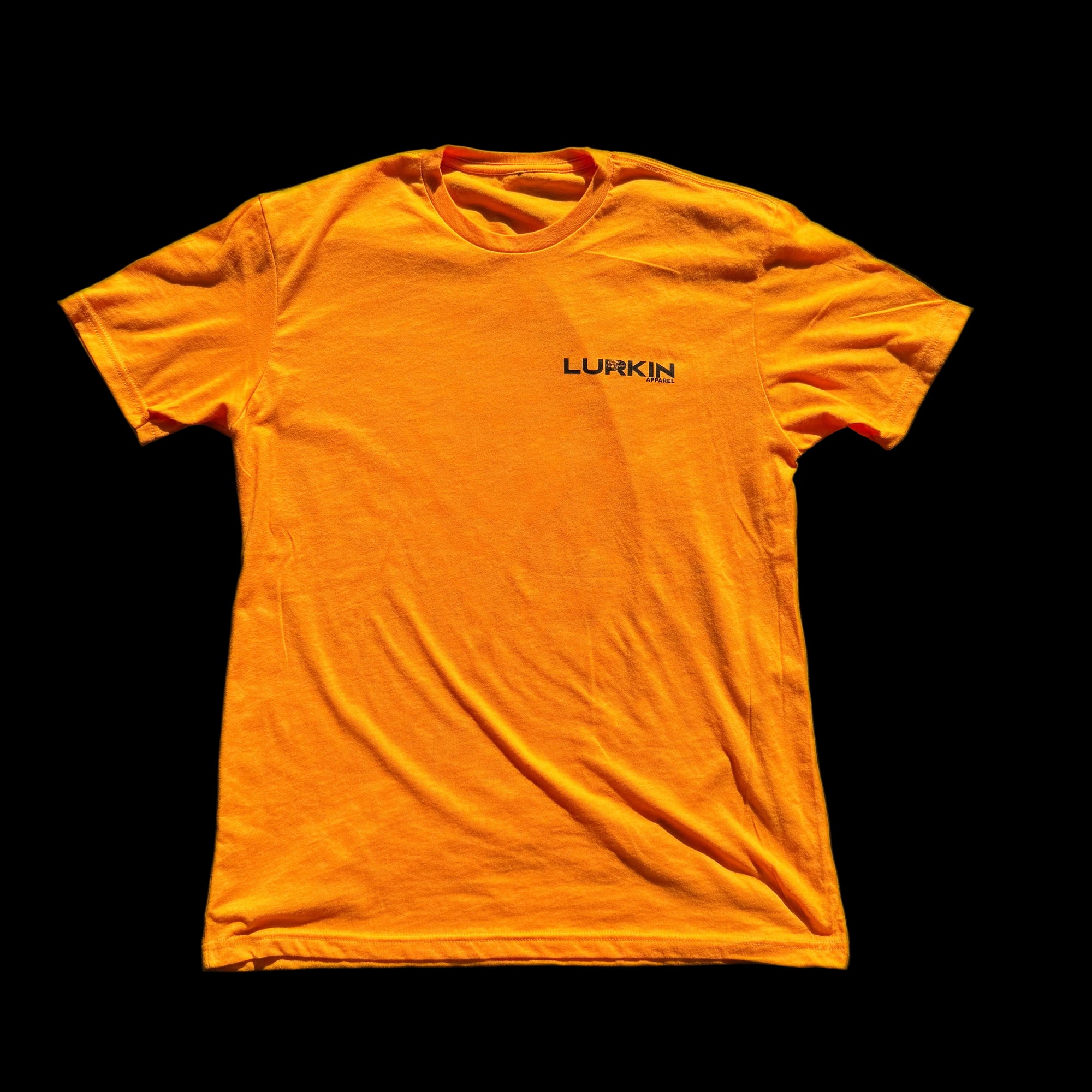 Orange t-shirt with 'Luerkin' logo on a black background