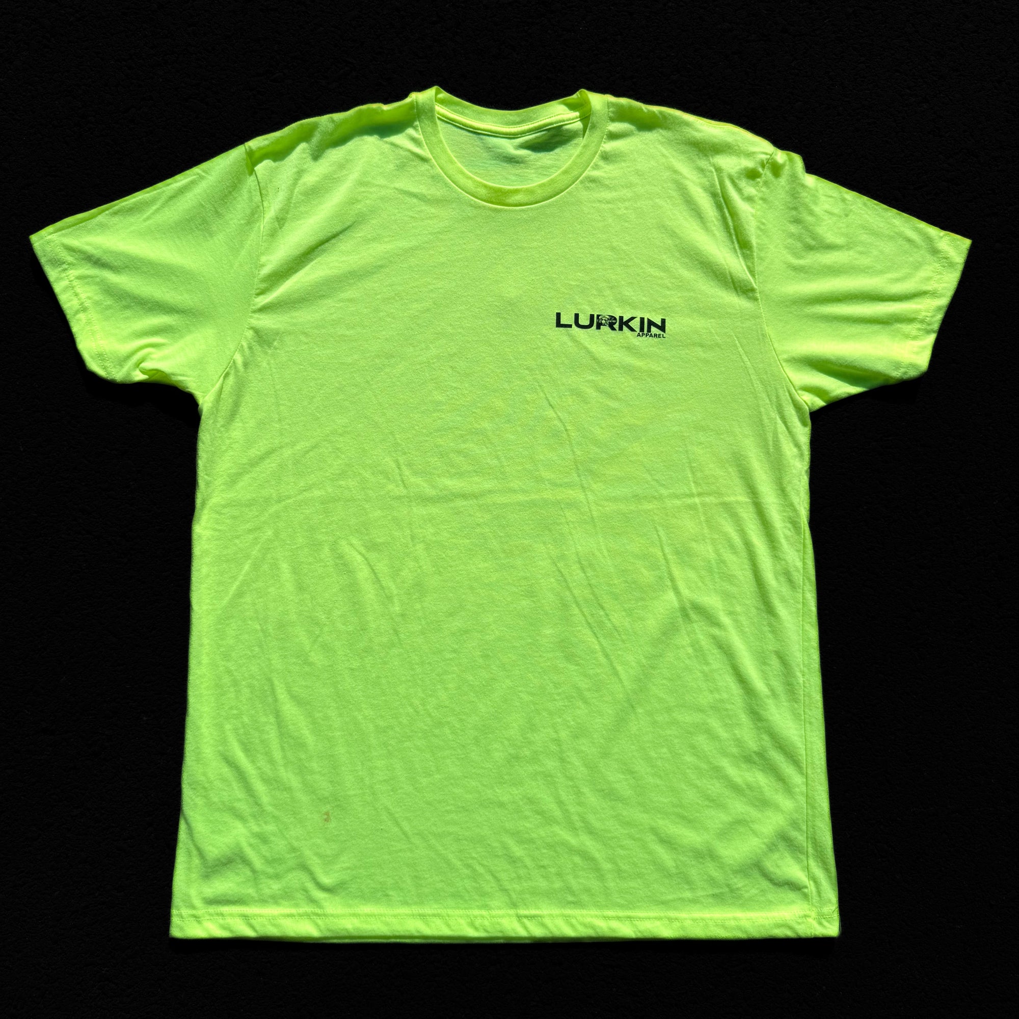 Neon green t-shirt with 'LUNKIN' logo on a black background